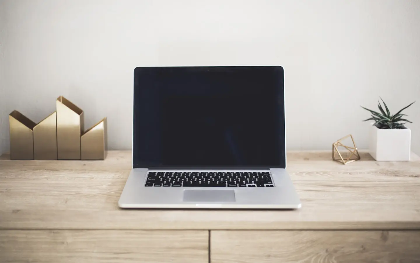 Used laptop open on a desk