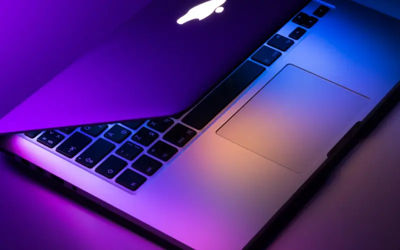 Silver laptop closed on a desk